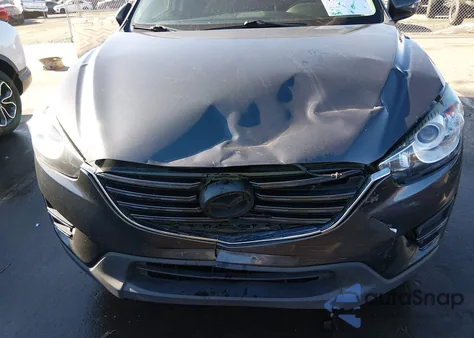 2016 Mazda Cx-5 Sport z USA, uszkodzony, nr VIN JM3KE2BY2G0885103